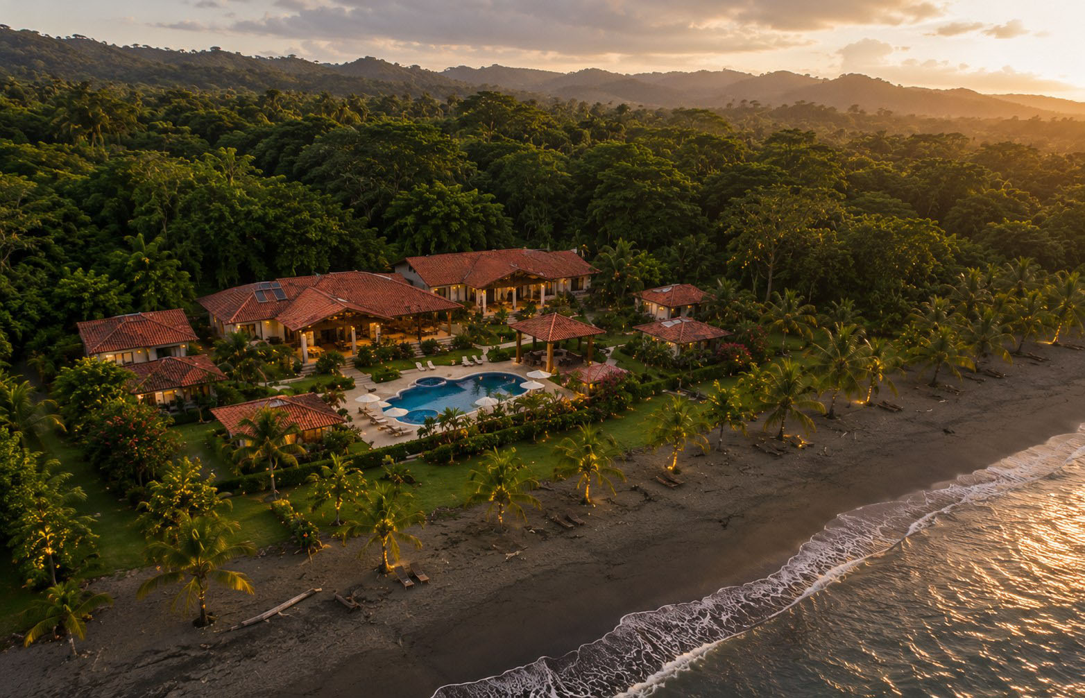 Blue Morpho Wellness Resort on the rainforest coastline at dusk